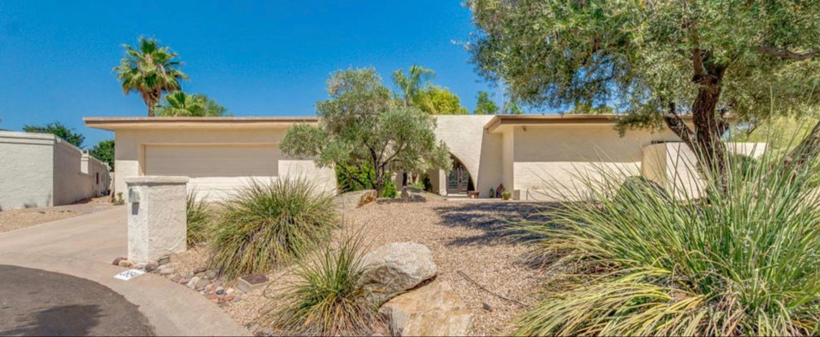 Mission project front courtyard before — basic entry with gravel landscaping